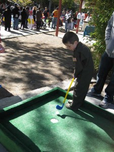 Billy playing putt putt